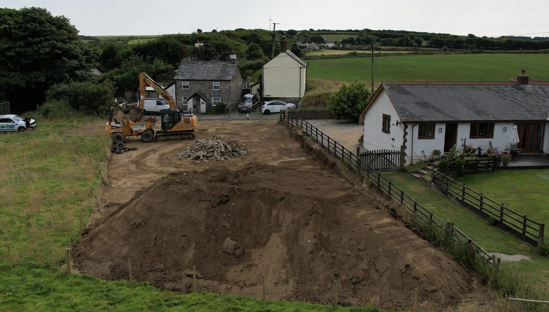 Digger Topsoil Heap